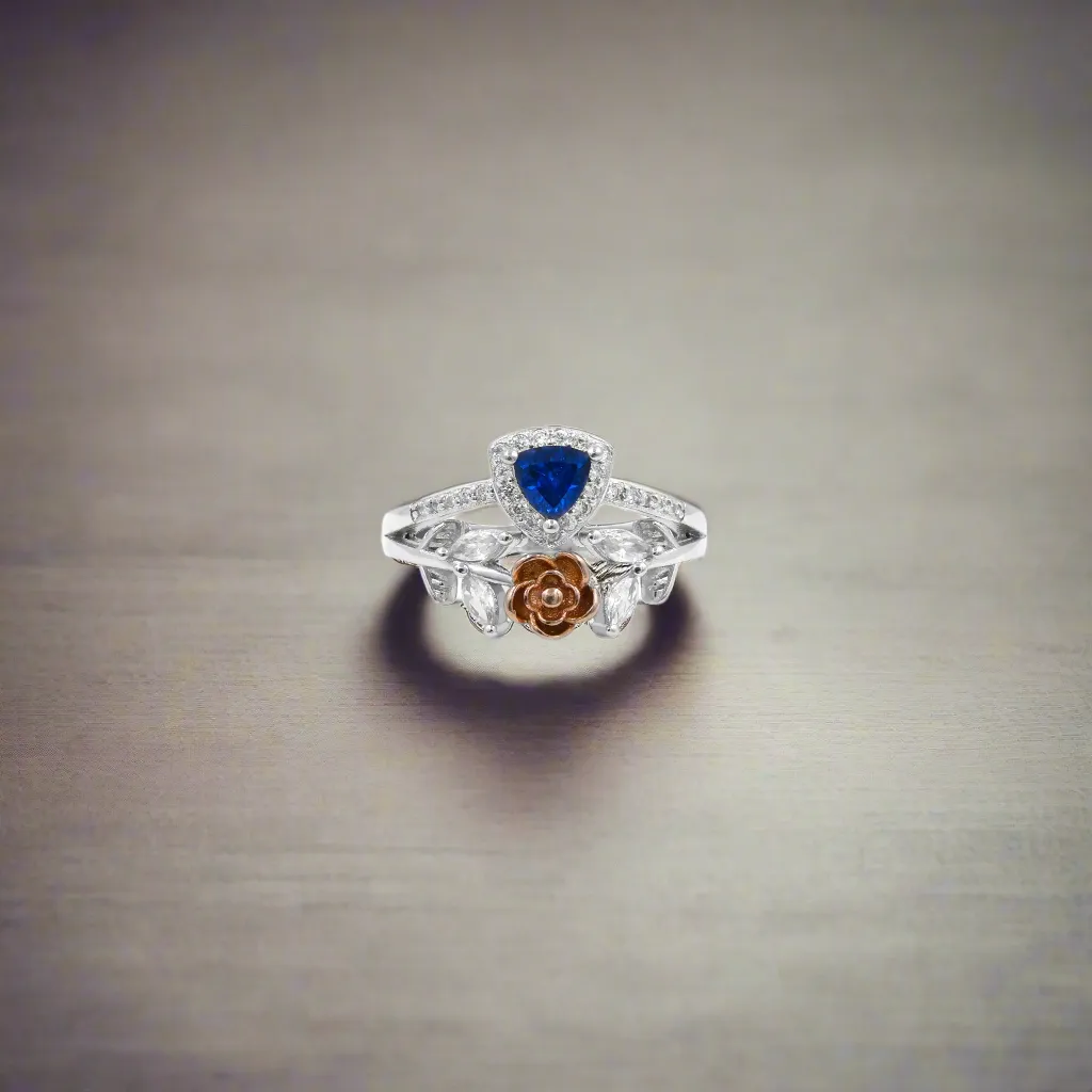 Floral Silver Ring with Blue Gemstone and Leaf Design